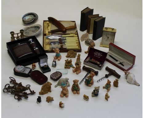 A mixed collector's lot. Including resin modelled bears, opera glasses, corkscrews, valet razor, quartz carriage clock, old k