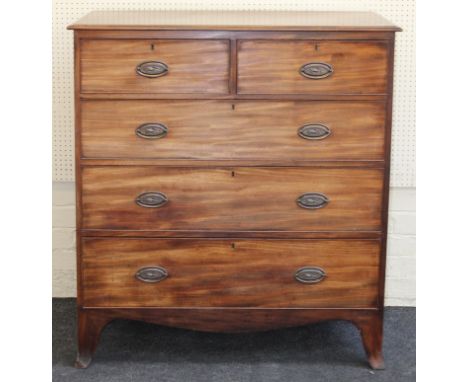 An early 19th century mahogany chest having two short and three long drawers fitted with later brass handles, raised on swept