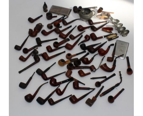 A collection of in excess of two dozen briar and other pipes, pewter pipe stands, Middle Eastern cigarette case etc