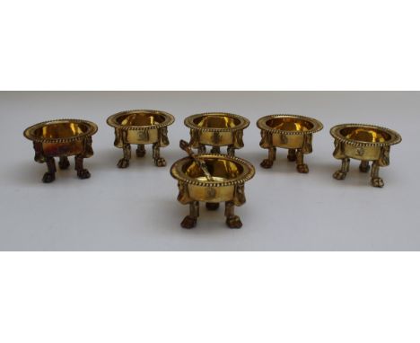 Set of six silver gilt salts in the Egyptian Revival style with one spoon, 5 x 9 cm. Two dated for 1805 marked TA, the remain