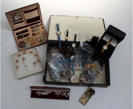 A large collection of costume jewellery to include sterling silver items. Rings, five watches, a boxed daisy chain set, a TA 