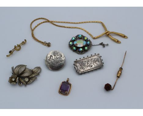 A mixed vintage jewellery lot to include two silver brooches, one rolled gold pendant, one snake necklace&nbsp;