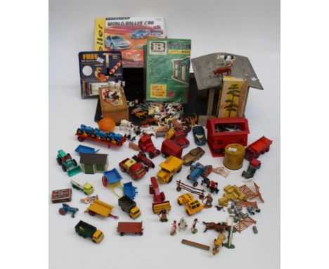 A homemade wooden farmyard, together with a good quantity of plastic farm animals and accessories, small quantity of die cast