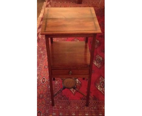 A GEORGIAN MAHOGANY WASHSTAND Having a single drawer, cross stretcher and crossbanded inlay, inset with a painted tile, depic