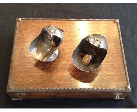 A 20TH CENTURY SILVER PLATED FORTY-TWO PIECE CANTEEN OF CUTLERY Having bone handles and contained in an oak box, together wit
