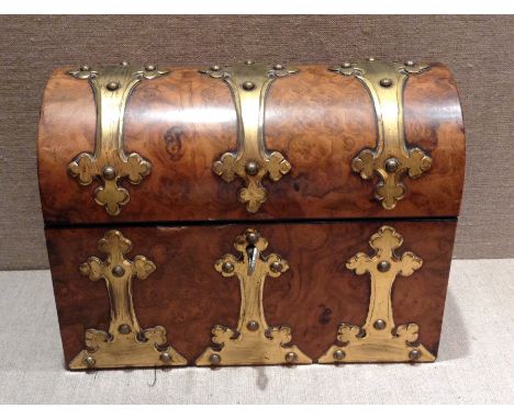 A VICTORIAN BURR WALNUT DOME TOP TEA CADDY Having Gothic style brass mounts and lids with ivory finials. (approx 23cm x 18cm 