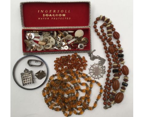 Silver badges South Africa, The Holy Bible, and other beads and a large collection of cuff links silver bangle and studs