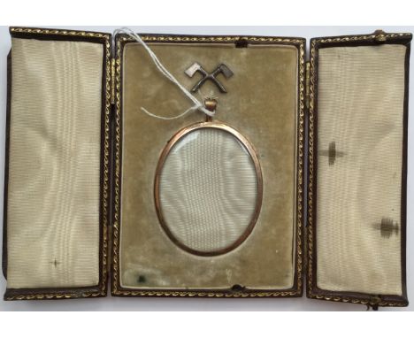 An Edwardian silver gilt oval framed portrait miniature, complete with original leather hinged case, London 1909, maker Georg
