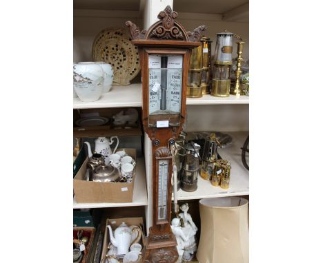 A 19th Century oak stick barometer 