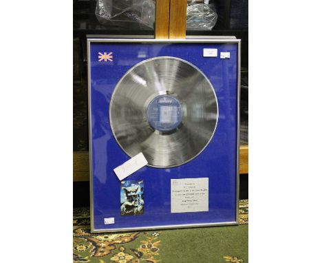 10cc Silver Disc: 'BPI Certified Sales Award Presented to Ric Dixon To recognise the sale, in the United Kingdom, of more tha