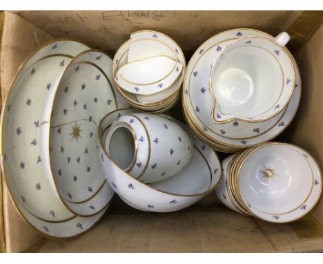 A late 18th Century Caughley "French Sprig" part tea service, with central gilt star motif and gilt banding, circa 1790 to in
