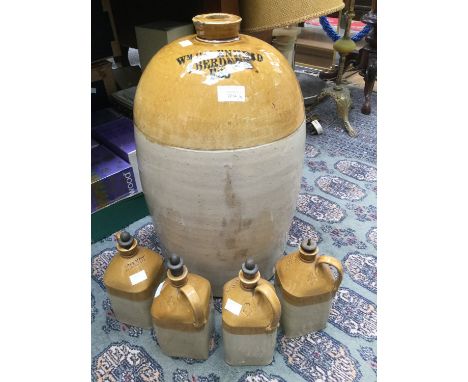 Large Aberdeen stoneware jar; together with four stoneware drink bottles, including Gin, Scotch, Whisky, Brandy, Irish Whisky