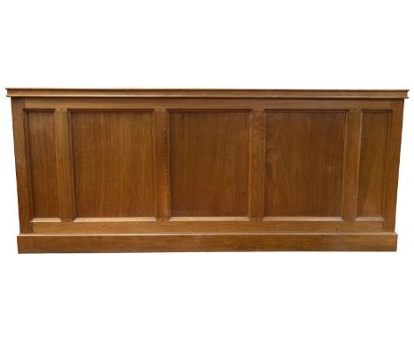 Robert 'Mouseman' Thompson of Kilburn, an Arts and Crafts carved oak altar table, five paneled front, the top carved with cro