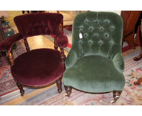 A Victorian deep button backed nursing chair, standing on turned legs, together with a further Victorian tub chair with red u