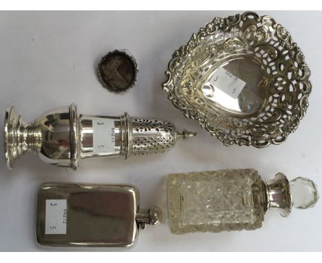 A George V silver caster, pierced detachable cone top, body engraved with a crest, London 1928 and a small hip flask, Birming