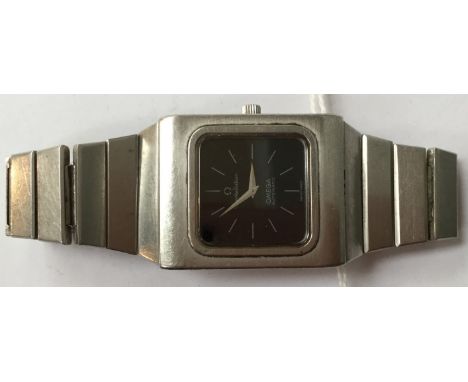 A gents Omega Constellation Automatic watch, 1970's style with black dial, batons and steel strap.Second hand missing
