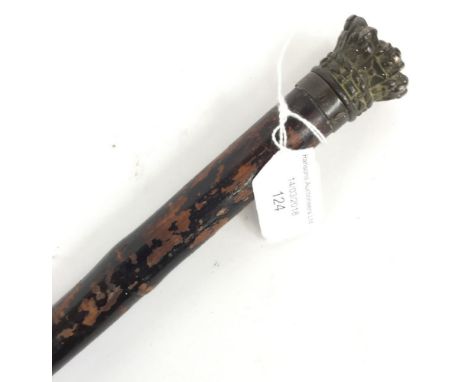 A walking stick with dagger/stiletto insert, the finial is a Crown and the manufacturer H.M Marylebone black lacquered cane, 