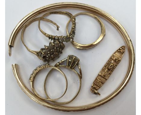 A 9ct gold charm of liner 'M.S. Patricia' with assorted 9ct gold rings and bangle, some items (af) total weight approx 17 gra