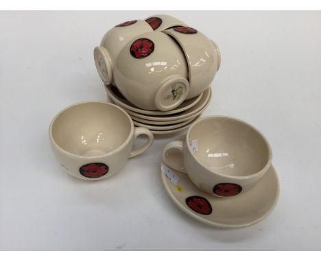 A Moorcroft set of six tea cups and saucers in the 'Poppy' pattern, on cream ground, all first quality, dated 2015 to base (1