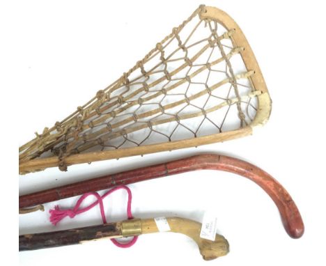 A vintage Lacrosse stick (Lillywhites of London) and two walking sticks (3) 