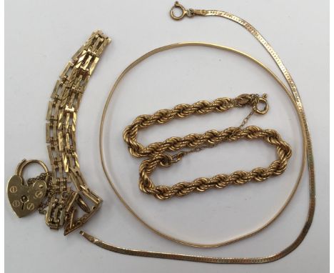 A 9ct gold gate bracelet with padlock clasp and two other 9ct bracelets (4) approx 19 grams 