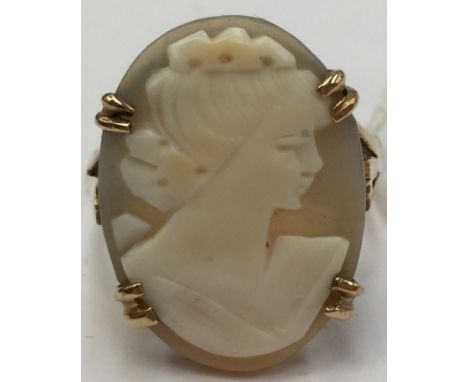 A 9ct gold cameo dress ring, set in 9ct gold, cameo depicting a ladies portrait, approx size 20mm x 15mm, finger size N, with