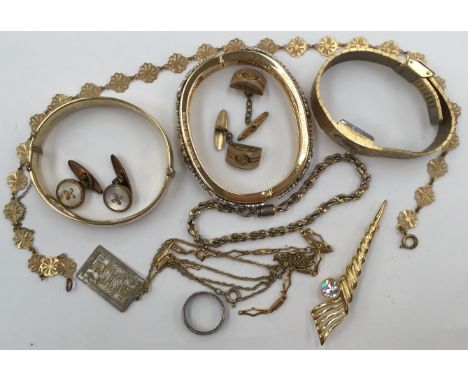 A quantity of yellow metal costume jewellery to include a rolled gold bangle, a gilt metal bangle with Claddagh design, two c