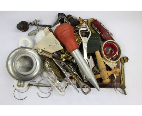 British legion badges, hip flask, corkscrew, brass paperweight, assorted items, spectacles, bung, lighter 