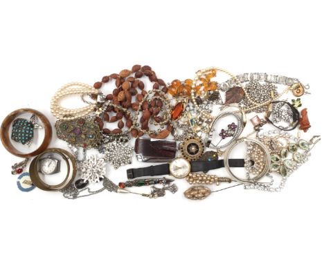 A collection of jewellery to include quantity a gold toggle clasp along with a 10 pound encased charm total gross weight appr