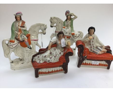 A pair of Staffordshire flatback figures, depicting lady and gentlemen, each on horseback and a further pair depicting lady a