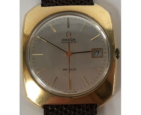 An Omega de Ville automatic gents gold plated wristwatch, circa 1970's, rectangular form, silvered dial with date aperture at