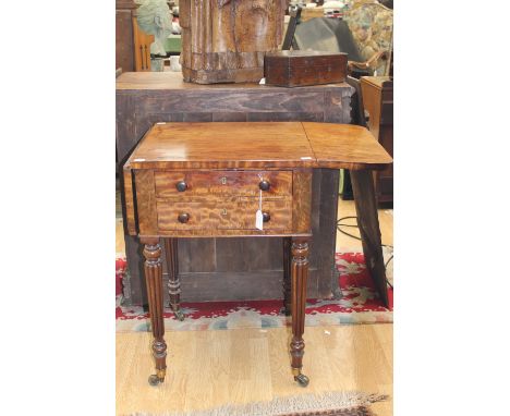 An early Victorian mahogany Pembroke table, fitted with two drawers, raised on turned legs