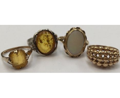 A collection of  9ct gold rings, comprising an opal ring set in an ornate rope style mount, size N, total gross weight approx