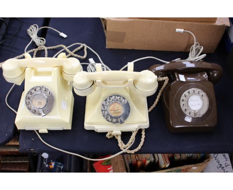 A 1950's ivory coloured 232 series telephone with 'cheese tray', (s.d), a 1950's ivory coloured 332 series telephone with 'ch