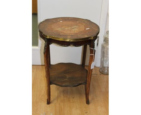 A French  inlaid gilt metal mounted table (water damage) 