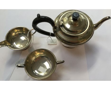 Three piece teapot set, comprising teapot, with millegrain detail, black handle, with matching milk jug and sugar bowl, Birmi