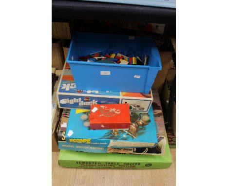 A collection of assorted games, comprising Flight Beck, Subbuteo, Scalextric, Escape from Colditz Castle, bingo game and a bo