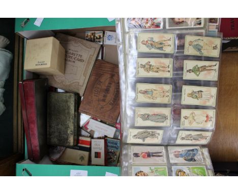 A quantity of cigarette cards in albums and loose collections, by Ogdens, Players Wills, etc; together with a Wedgwood Jasper