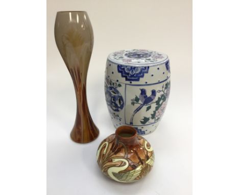 An 'Old Tupton' ware baluster shaped vase together with a tall art glass vase and a ceramic garden seat (3)