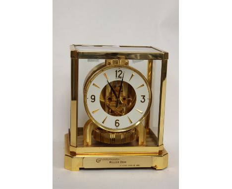 Atmos mantle clock, Swiss made, fitted in brass case, Jaeger-LeCoultre movement