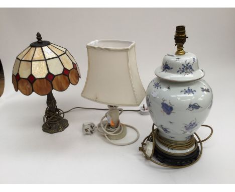 Three table lamps, one Tiffany style, one ceramic flower and butterfly design and one onyx (3)