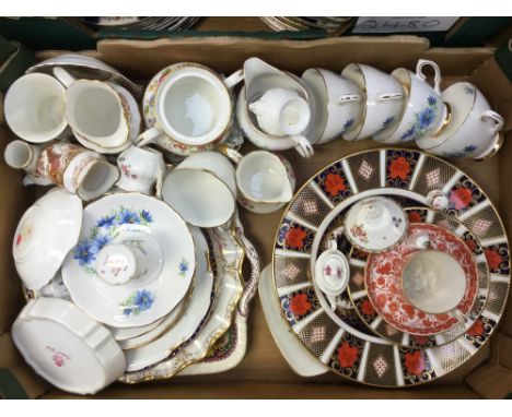 A collection of Royal Crown Derby ceramics, including a 1128 Imari pattern dinner plate, a 1128 pattern side plate, Derby Pos