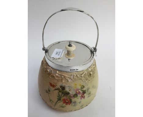 A blush ivory Royal Worcester, silver mounted, biscuit barrel with swing handle and silver lid with ivory knop, Walker and Ha