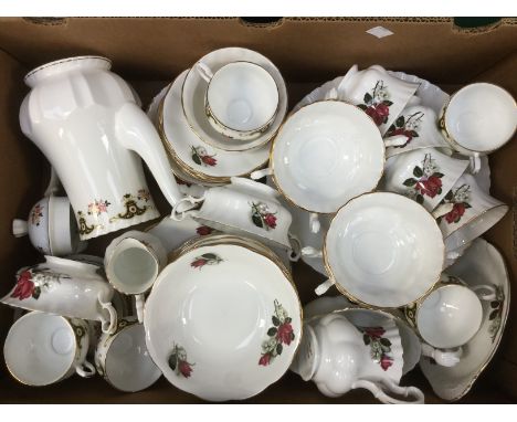 A quantity of Magna China dinner and tea wares in a floral pattern together with a Crown Fenton coffee service (1 box)