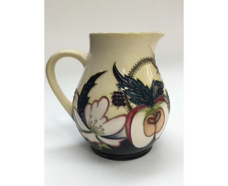 A Moorcroft limited edition jug in the 'Bramble Revisited' pattern, designed by Alicia Amison first quality standing approx 1