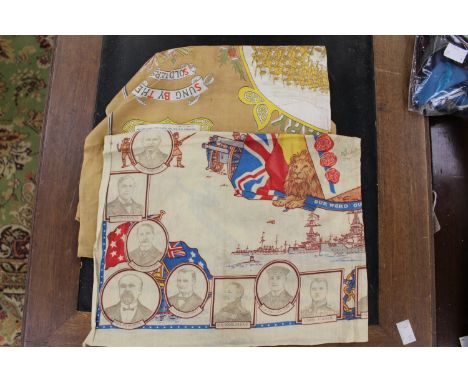 An Edwardian handkerchief by Bertha, one Botham embroidered with pale gold thread in the design of a flower basket, a long si
