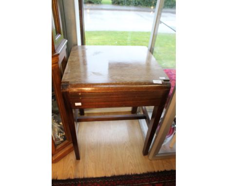 An early 20th Century Art Deco mahogany side table, with a single drawer