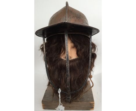 A Cromwellian style steel helmet, on mannequin head stand 