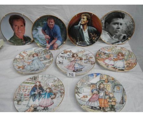 A mixed lot of collector's plates including 4 Royal Worcester Christmas plates, 4 dog related plates and 4 Danbury Mint Cliff