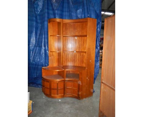 A pair of teak corner cupboard/shelf units, the small having lighting,  1 x H 200 cm, W 100 cm, D 50 cm, 1 x H 200 cm, W 60 c